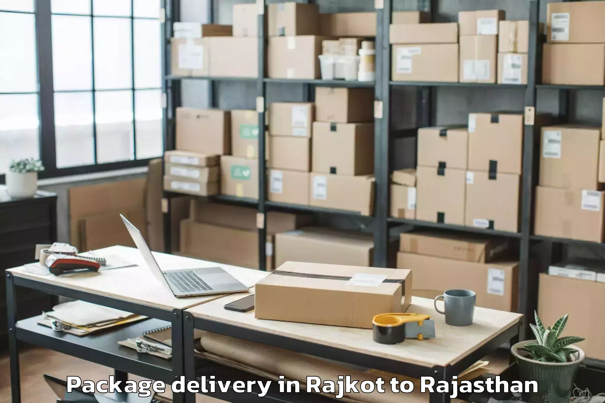 Book Rajkot to Jamwa Ramgarh Package Delivery